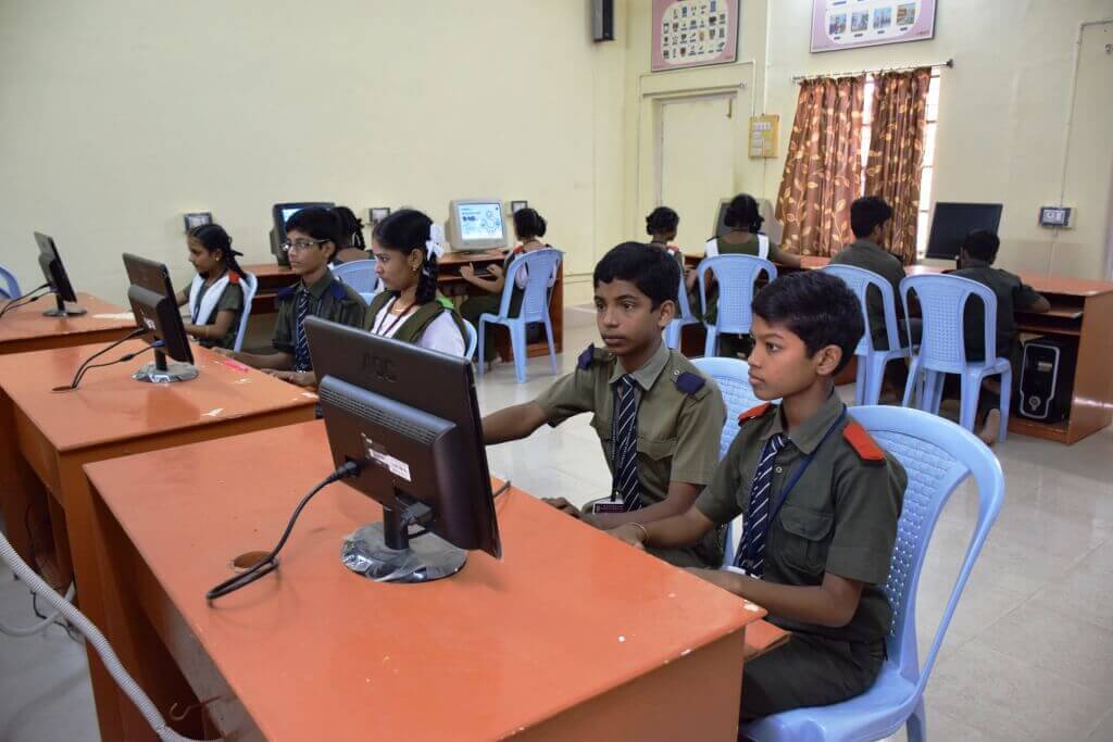 Students at workstations in the computer lab